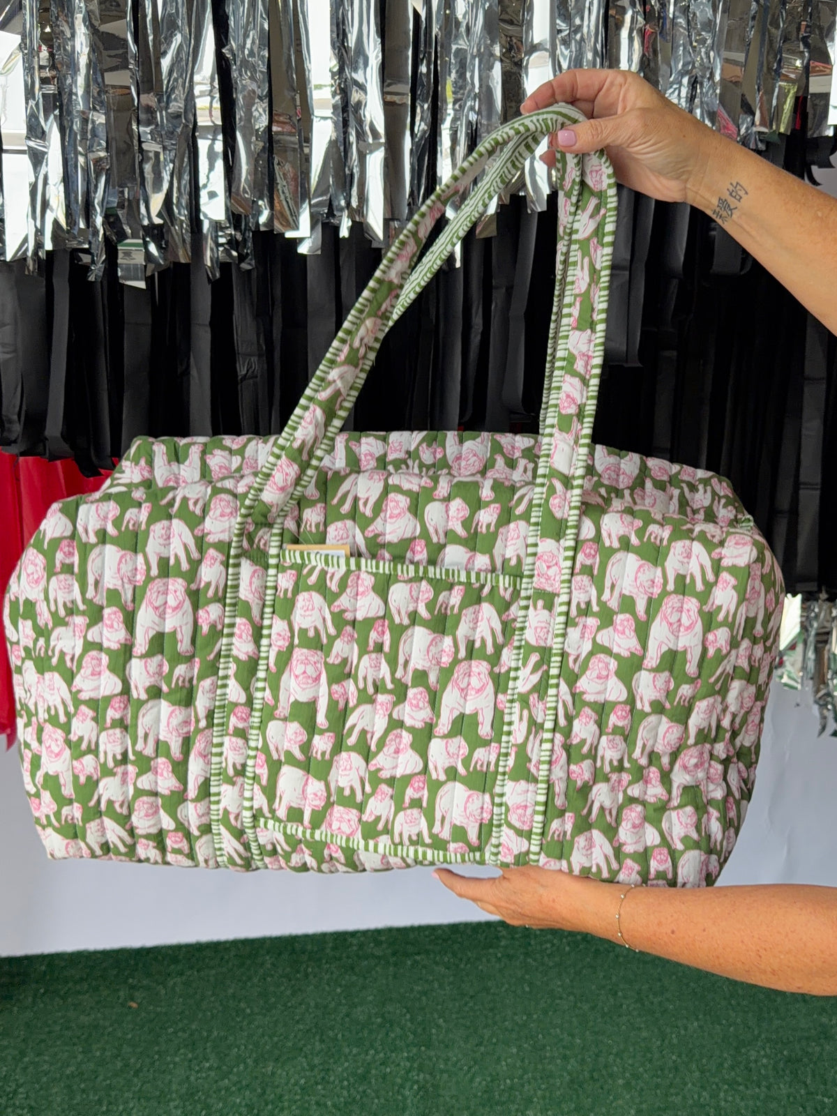 Green and pink quilted bulldog duffle
