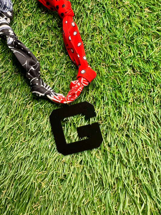 Black G charm scarf necklace