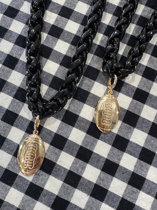 Black chain necklace with gold football charm