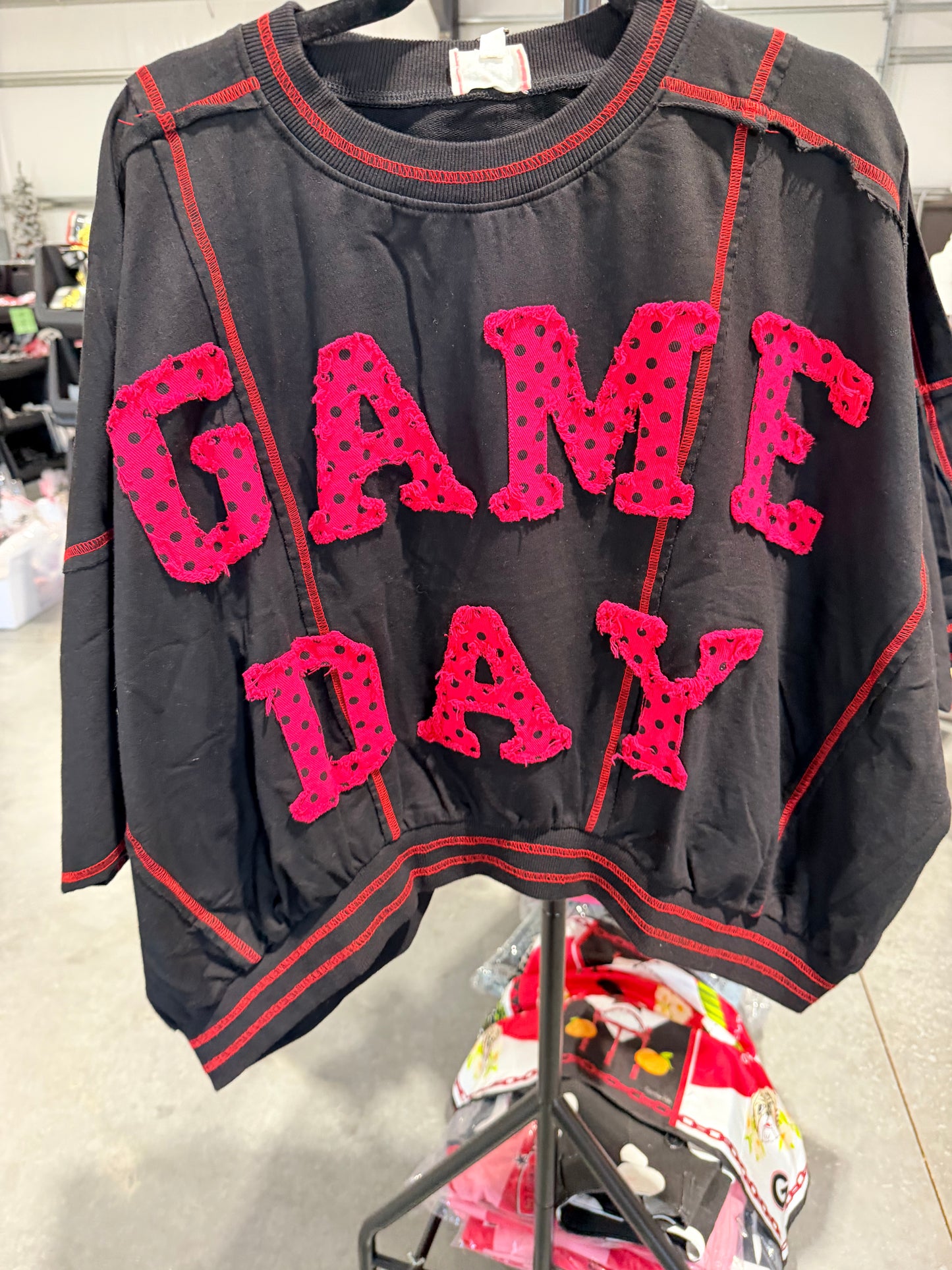 Game day oversized black top