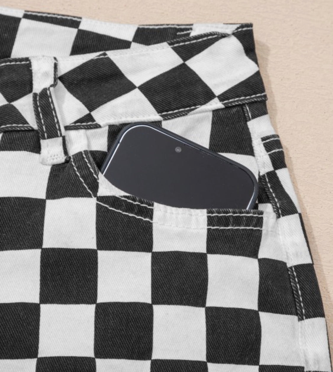 Game day black and white checked distressed raw edge jeans