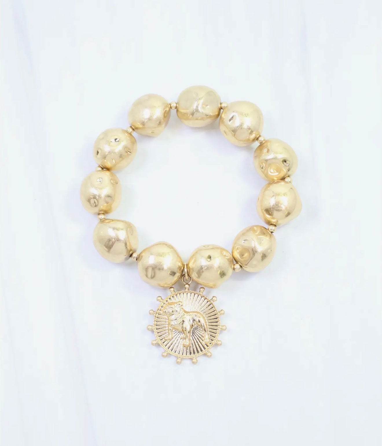Giant worn gold stretchy bracelet bulldog