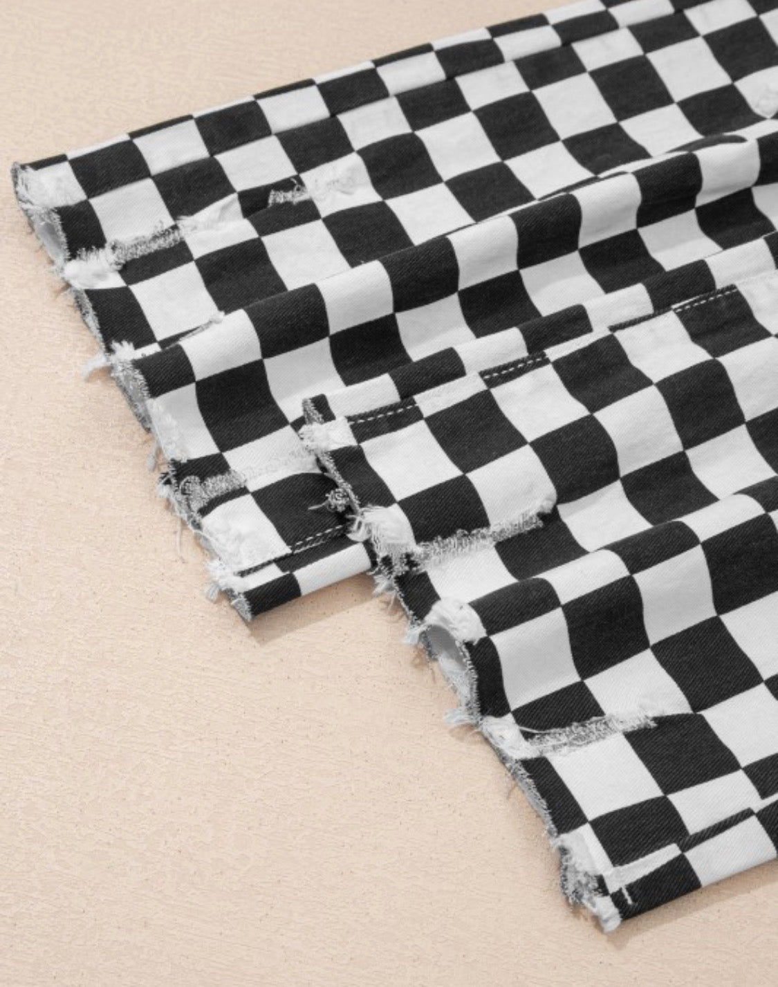 Game day black and white checked distressed raw edge jeans