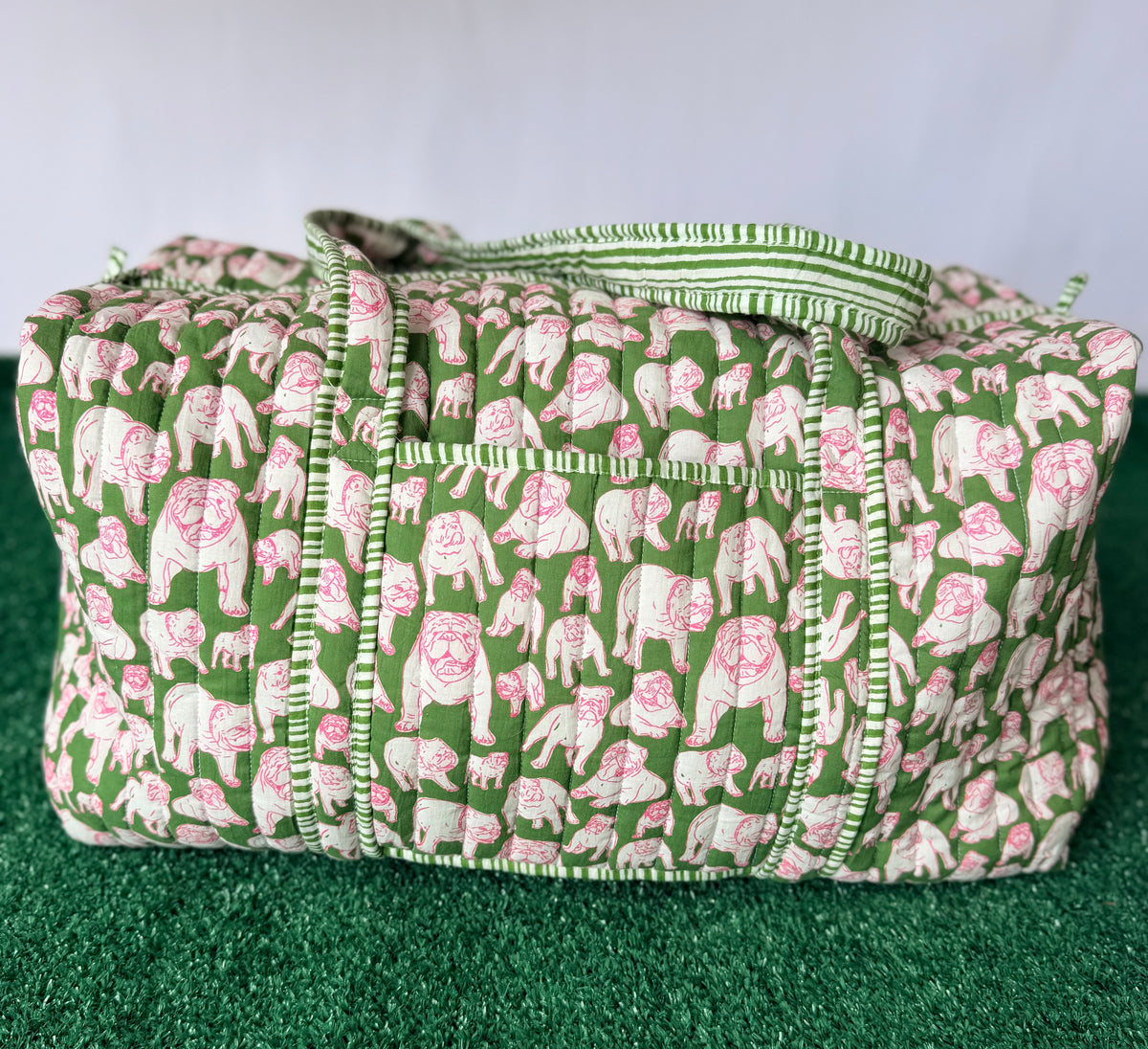 Green and pink quilted bulldog duffle