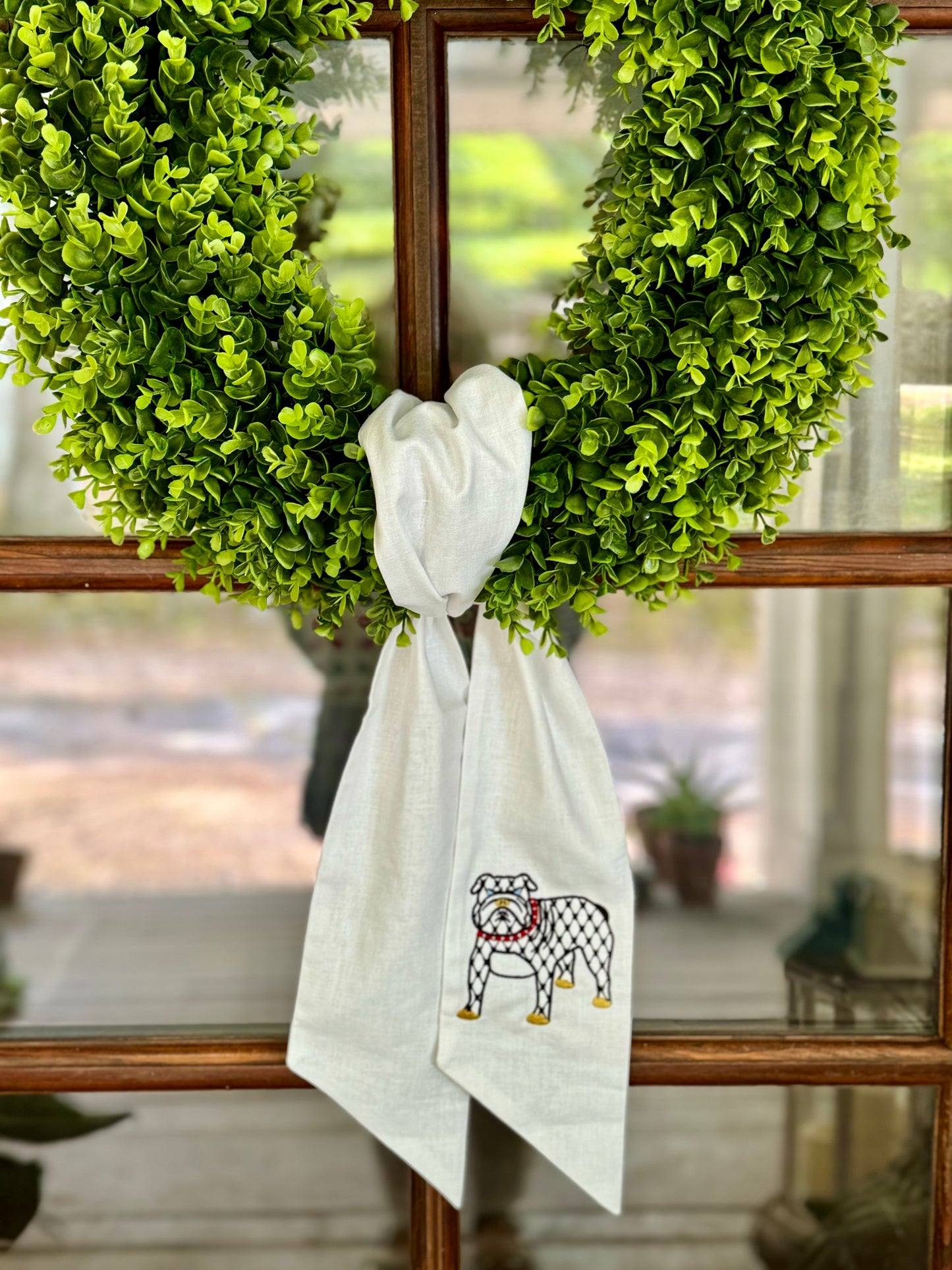 Wreath sash with embroidered dog