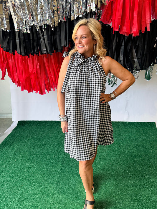 Black and white gingham swing dress with bow