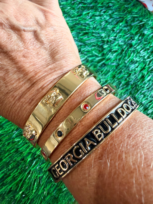 Gold bangle with black and red