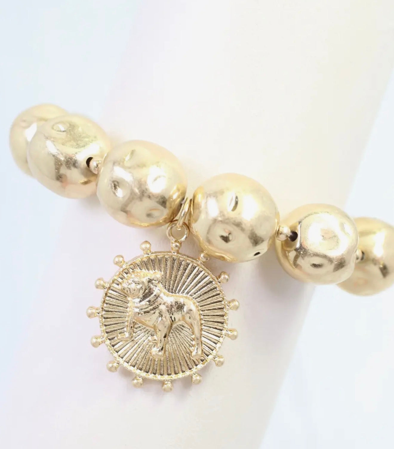 Giant worn gold stretchy bracelet bulldog