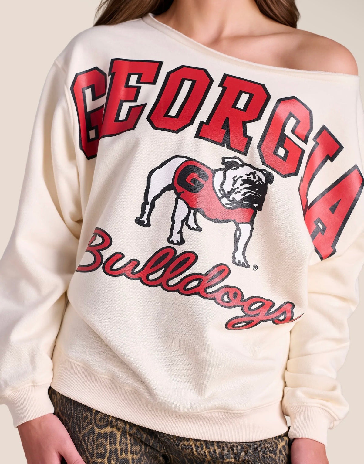 Off the shoulder licensed sweatshirt