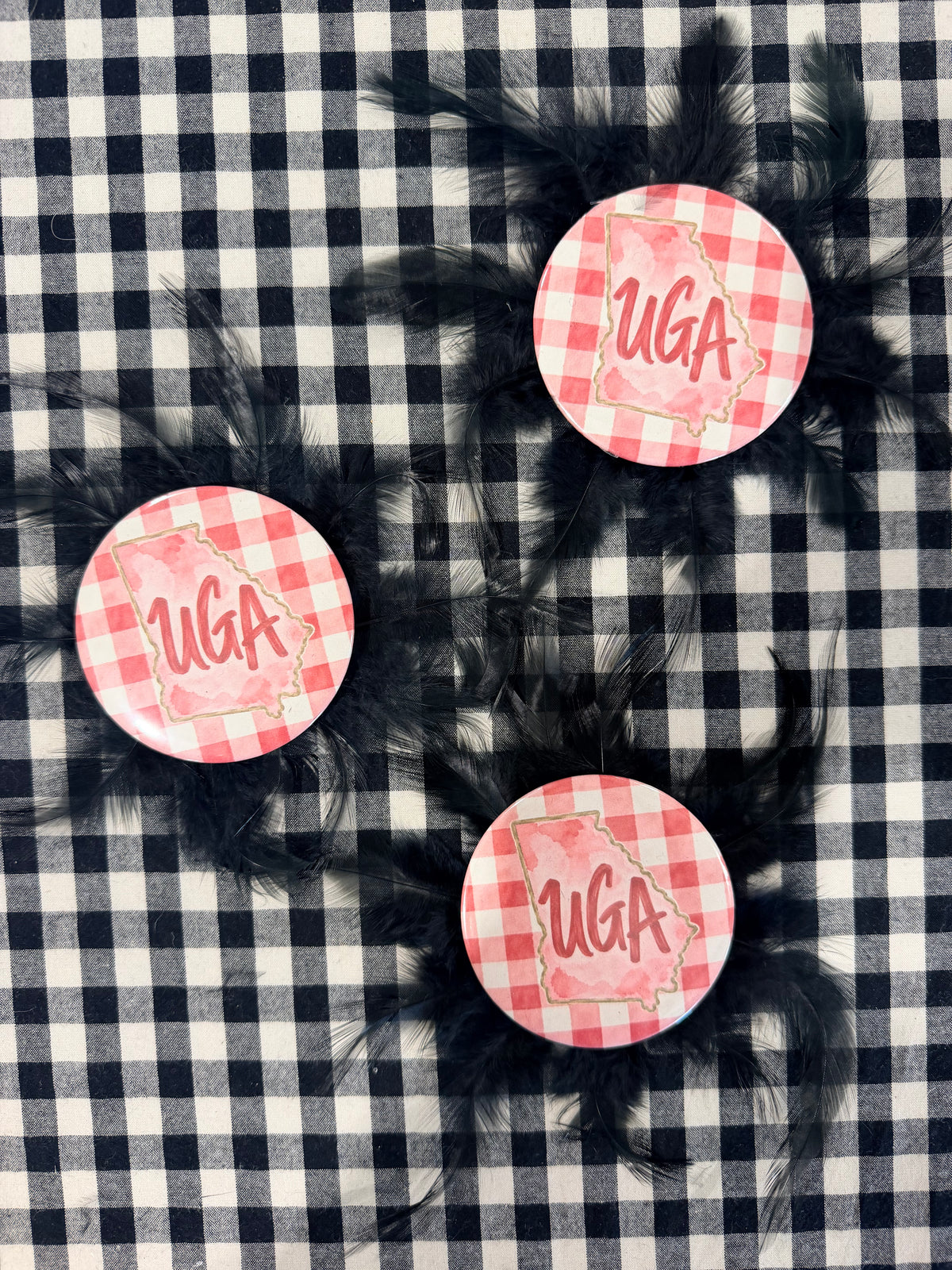 Feather game day buttons
