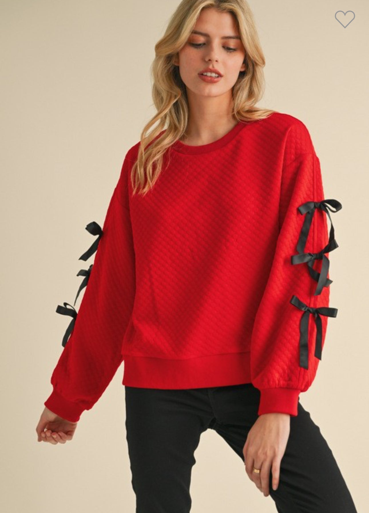 Embossed textured red top with black bows