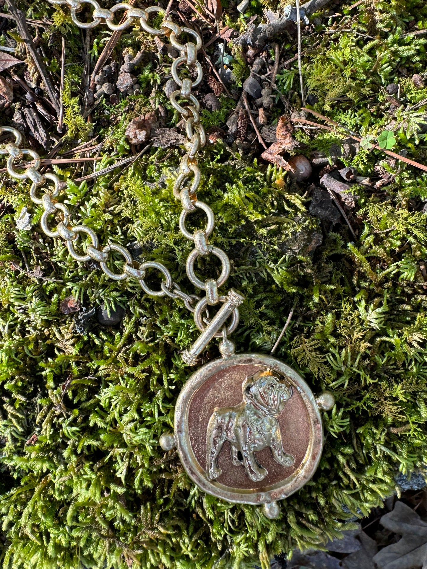 Standing dog medallion necklace