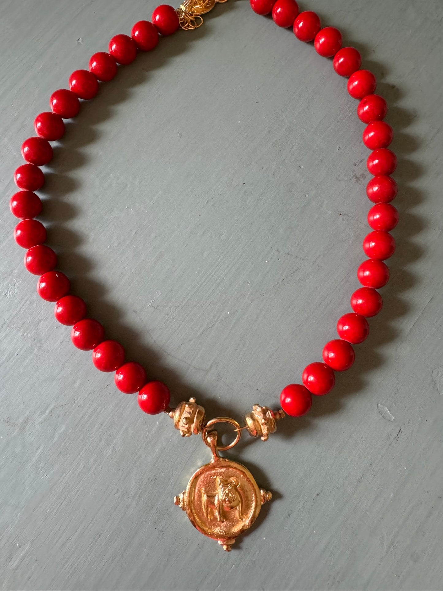 Susan Shaw Red coral gold bulldog medallion necklace