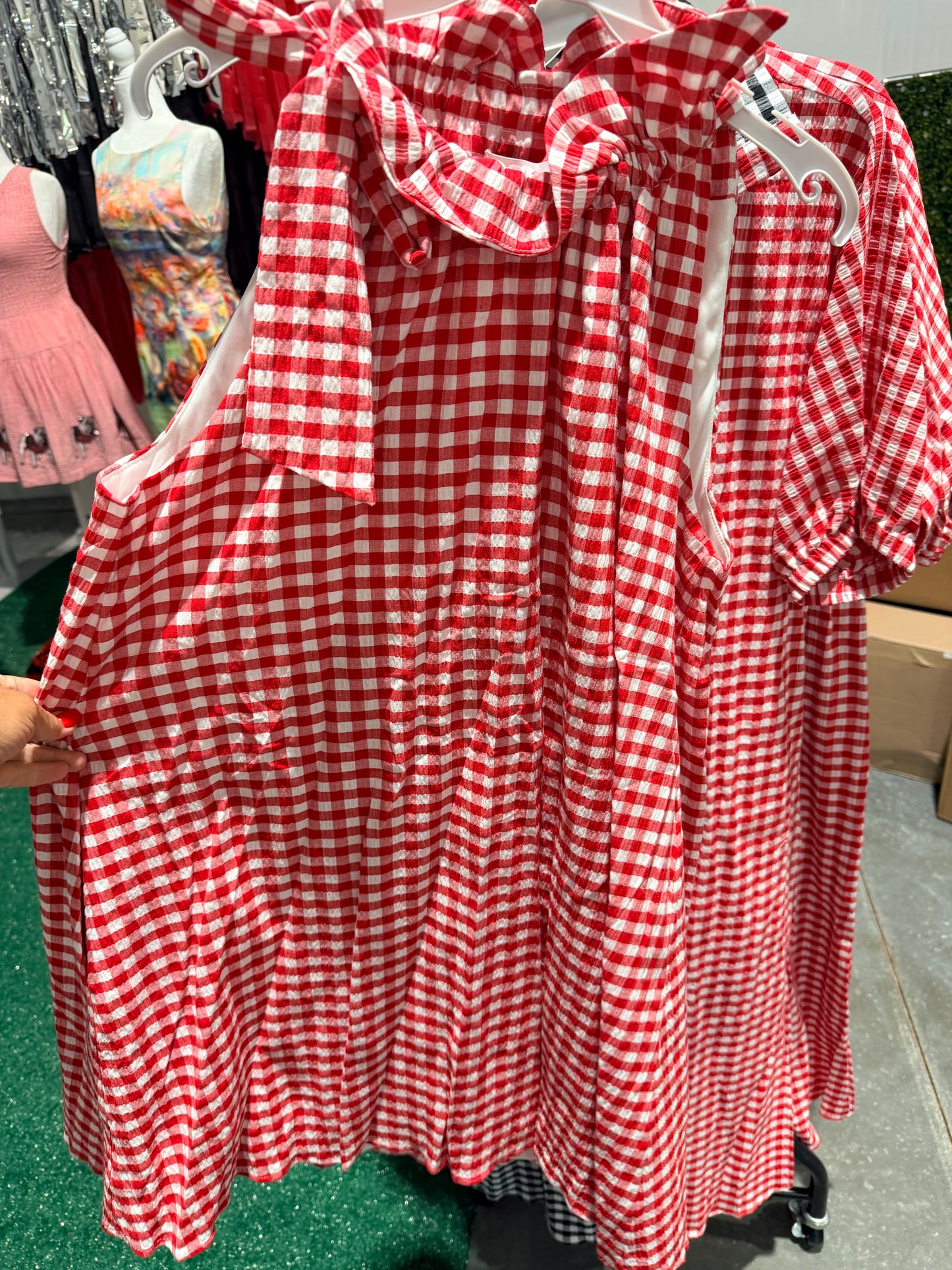 Red gingham swing dress with ruffle collar and bow