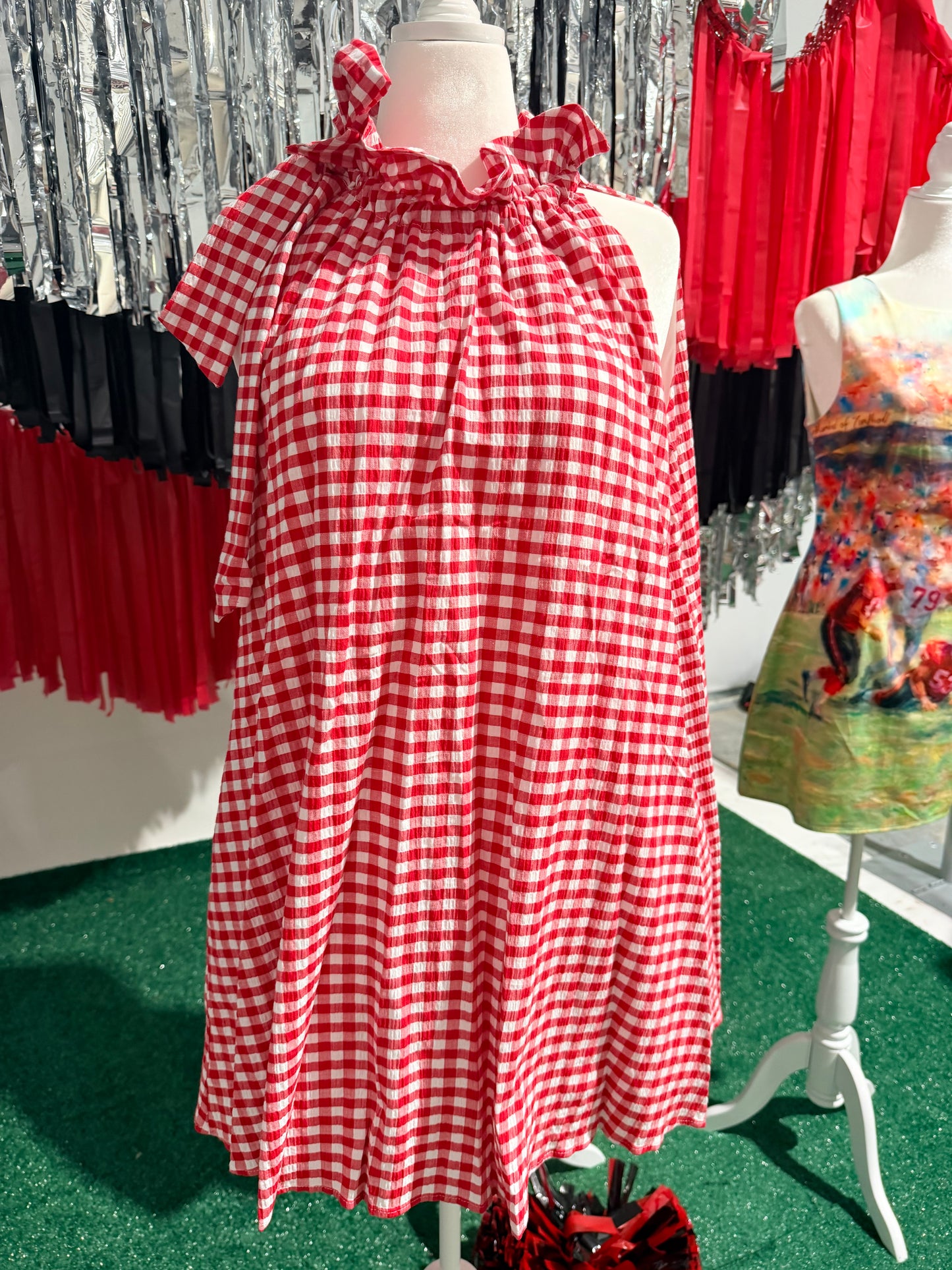 Red gingham swing dress with ruffle collar and bow