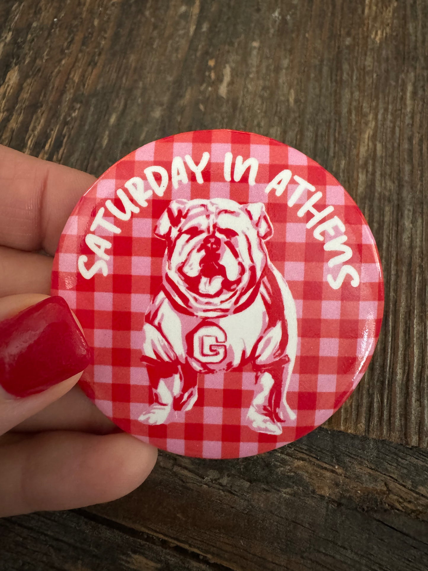 Game day button Saturday in Athens