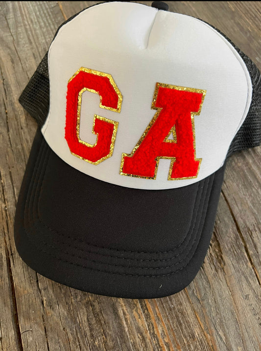 Trucker hat black and white with red fuzzy GA patch