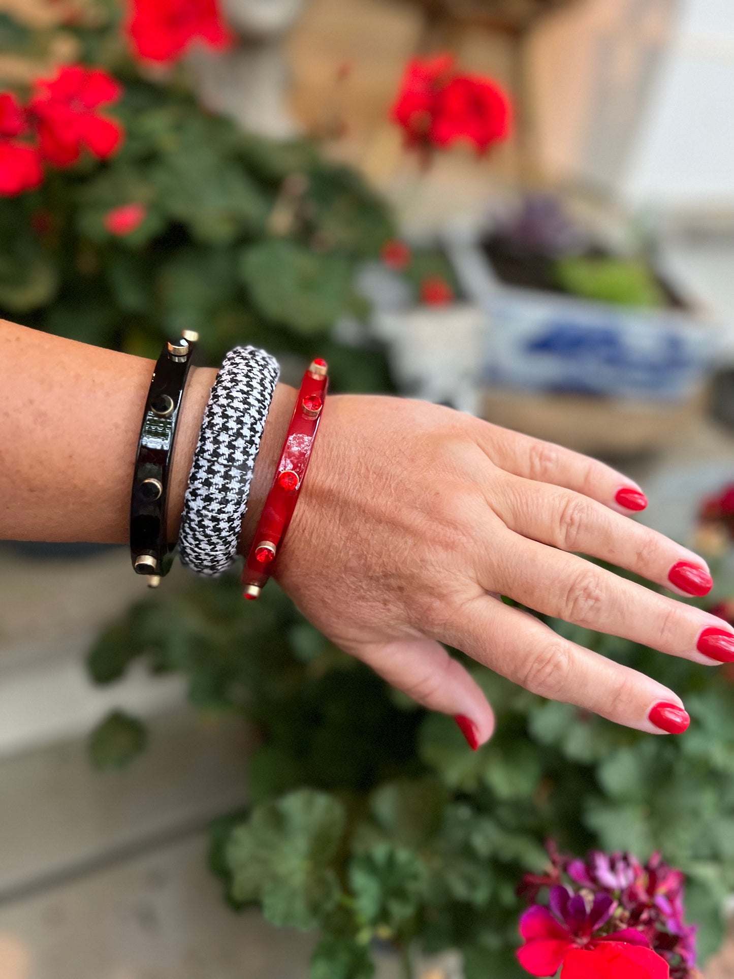 Red resin bracelet with rhinestone studs