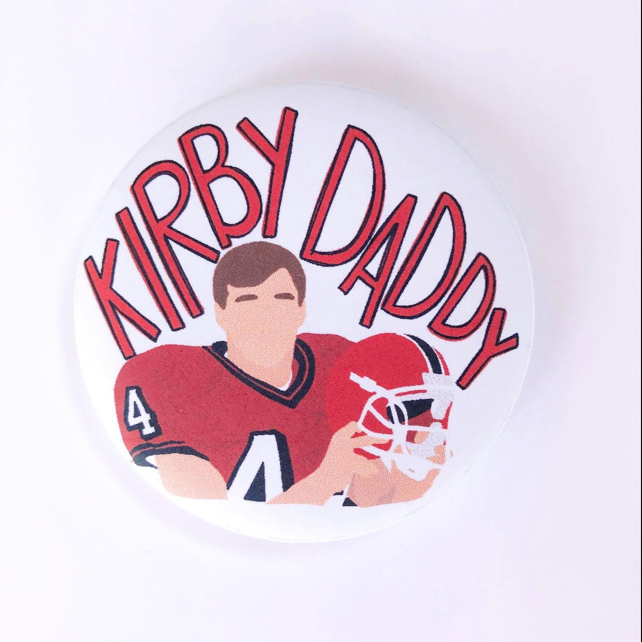 Game day button black and red football