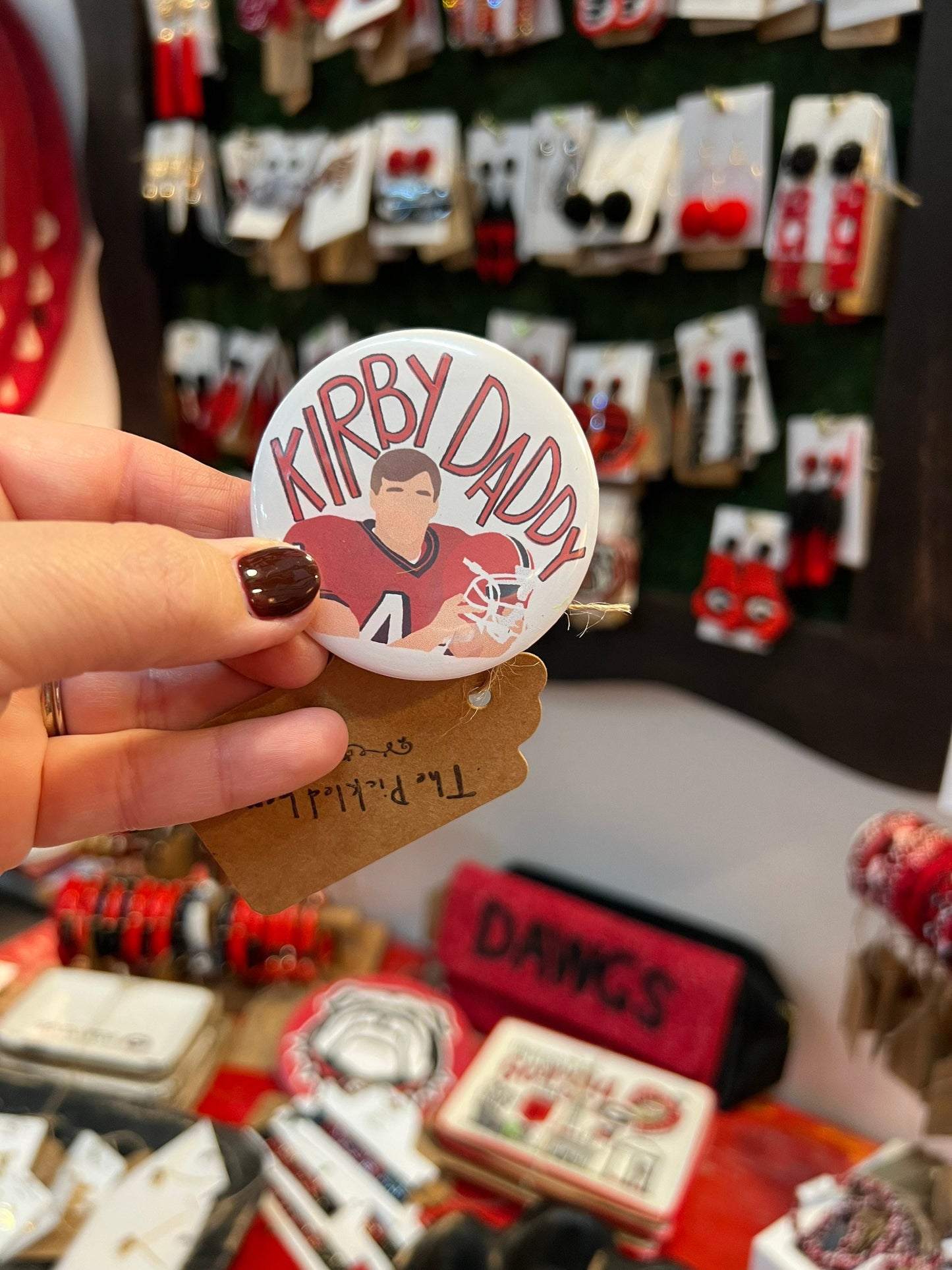 Game day button black and red football